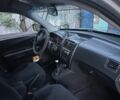Серый Хендай Туксон, объемом двигателя 2 л и пробегом 267 тыс. км за 4833 $, фото 3 на Automoto.ua