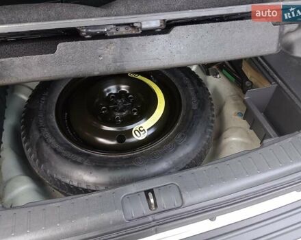 Сірий Хендай Туксон, об'ємом двигуна 1.98 л та пробігом 225 тис. км за 6999 $, фото 17 на Automoto.ua