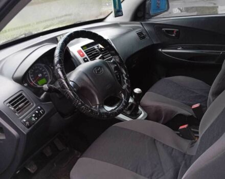 Серый Хендай Туксон, объемом двигателя 2 л и пробегом 168 тыс. км за 7500 $, фото 5 на Automoto.ua