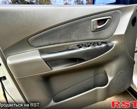 Сірий Хендай Туксон, об'ємом двигуна 2 л та пробігом 316 тис. км за 6780 $, фото 4 на Automoto.ua