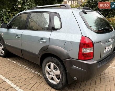 Серый Хендай Туксон, объемом двигателя 1.98 л и пробегом 218 тыс. км за 7900 $, фото 5 на Automoto.ua