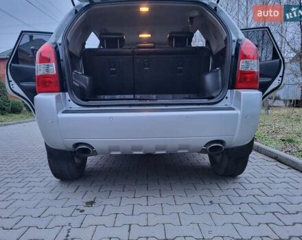 Серый Хендай Туксон, объемом двигателя 2 л и пробегом 240 тыс. км за 8300 $, фото 75 на Automoto.ua