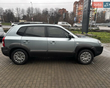 Сірий Хендай Туксон, об'ємом двигуна 2 л та пробігом 255 тис. км за 7600 $, фото 10 на Automoto.ua