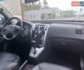 Сірий Хендай Туксон, об'ємом двигуна 2 л та пробігом 190 тис. км за 8600 $, фото 52 на Automoto.ua