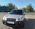 Серый Хендай Туксон, объемом двигателя 1.99 л и пробегом 226 тыс. км за 6300 $, фото 1 на Automoto.ua