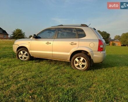 Серый Хендай Туксон, объемом двигателя 1.99 л и пробегом 239 тыс. км за 7800 $, фото 8 на Automoto.ua