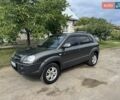 Серый Хендай Туксон, объемом двигателя 1.98 л и пробегом 283 тыс. км за 8000 $, фото 2 на Automoto.ua