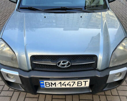 Серый Хендай Туксон, объемом двигателя 1.98 л и пробегом 269 тыс. км за 7500 $, фото 13 на Automoto.ua