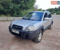 Сірий Хендай Туксон, об'ємом двигуна 2 л та пробігом 240 тис. км за 7499 $, фото 1 на Automoto.ua
