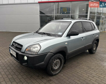Сірий Хендай Туксон, об'ємом двигуна 2 л та пробігом 255 тис. км за 7600 $, фото 3 на Automoto.ua
