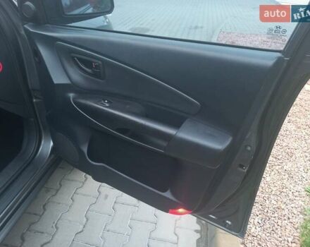Сірий Хендай Туксон, об'ємом двигуна 2 л та пробігом 190 тис. км за 8600 $, фото 41 на Automoto.ua