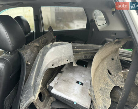 Серый Хендай Туксон, объемом двигателя 1.98 л и пробегом 340 тыс. км за 3999 $, фото 7 на Automoto.ua