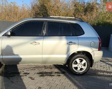 Серый Хендай Туксон, объемом двигателя 1.98 л и пробегом 193 тыс. км за 8400 $, фото 7 на Automoto.ua