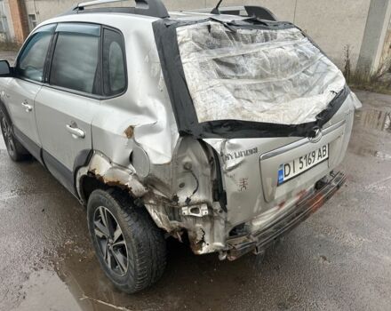 Серый Хендай Туксон, объемом двигателя 2 л и пробегом 350 тыс. км за 3850 $, фото 4 на Automoto.ua