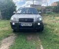 Серый Хендай Туксон, объемом двигателя 2 л и пробегом 228 тыс. км за 7400 $, фото 1 на Automoto.ua