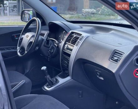 Серый Хендай Туксон, объемом двигателя 2 л и пробегом 182 тыс. км за 7600 $, фото 25 на Automoto.ua