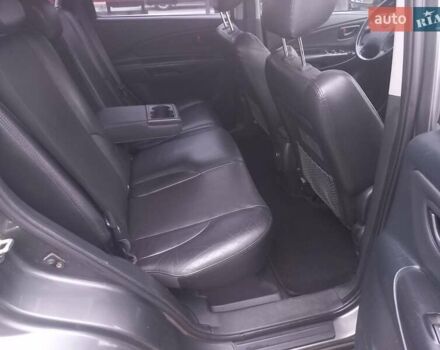 Сірий Хендай Туксон, об'ємом двигуна 2 л та пробігом 190 тис. км за 8600 $, фото 49 на Automoto.ua