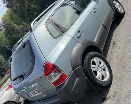 Сірий Хендай Туксон, об'ємом двигуна 2 л та пробігом 170 тис. км за 8700 $, фото 4 на Automoto.ua