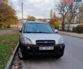 Серый Хендай Туксон, объемом двигателя 2 л и пробегом 198 тыс. км за 7000 $, фото 1 на Automoto.ua