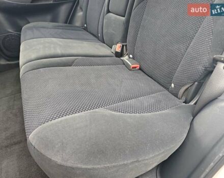 Серый Хендай Туксон, объемом двигателя 1.98 л и пробегом 173 тыс. км за 7450 $, фото 10 на Automoto.ua