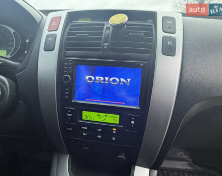 Сірий Хендай Туксон, об'ємом двигуна 1.98 л та пробігом 169 тис. км за 7890 $, фото 8 на Automoto.ua