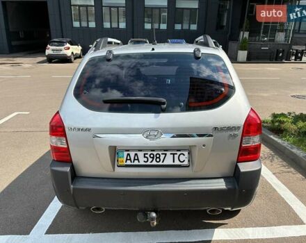 Серый Хендай Туксон, объемом двигателя 2.7 л и пробегом 297 тыс. км за 8000 $, фото 5 на Automoto.ua