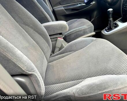 Сірий Хендай Туксон, об'ємом двигуна 2 л та пробігом 316 тис. км за 6780 $, фото 9 на Automoto.ua