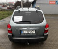Сірий Хендай Туксон, об'ємом двигуна 2 л та пробігом 255 тис. км за 7600 $, фото 7 на Automoto.ua