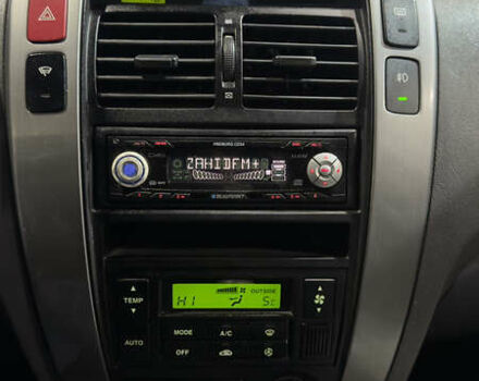 Серый Хендай Туксон, объемом двигателя 2 л и пробегом 222 тыс. км за 7950 $, фото 25 на Automoto.ua