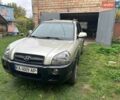 Серый Хендай Туксон, объемом двигателя 1.99 л и пробегом 186 тыс. км за 7800 $, фото 1 на Automoto.ua