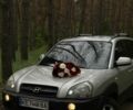 Серый Хендай Туксон, объемом двигателя 2 л и пробегом 224 тыс. км за 8250 $, фото 1 на Automoto.ua