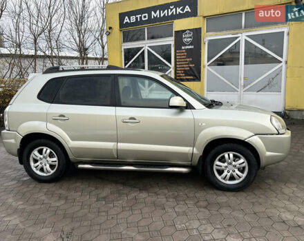 Сірий Хендай Туксон, об'ємом двигуна 2 л та пробігом 257 тис. км за 6550 $, фото 7 на Automoto.ua