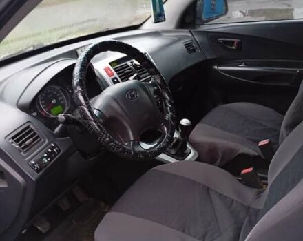 Серый Хендай Туксон, объемом двигателя 2 л и пробегом 169 тыс. км за 6999 $, фото 3 на Automoto.ua