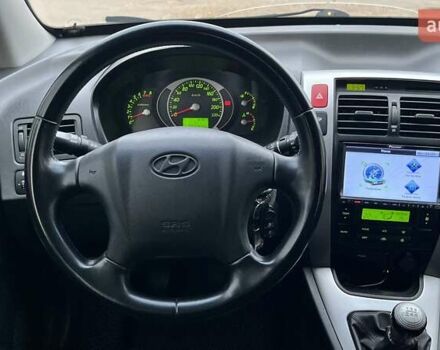 Сірий Хендай Туксон, об'ємом двигуна 1.98 л та пробігом 281 тис. км за 7200 $, фото 12 на Automoto.ua