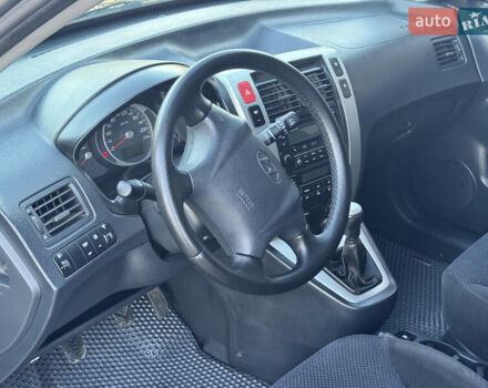 Серый Хендай Туксон, объемом двигателя 1.99 л и пробегом 315 тыс. км за 7300 $, фото 15 на Automoto.ua