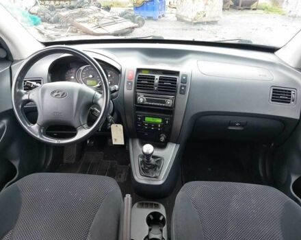Серый Хендай Туксон, объемом двигателя 2 л и пробегом 245 тыс. км за 4112 $, фото 5 на Automoto.ua