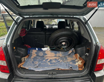 Сірий Хендай Туксон, об'ємом двигуна 2 л та пробігом 255 тис. км за 7600 $, фото 26 на Automoto.ua