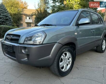 Серый Хендай Туксон, объемом двигателя 2 л и пробегом 110 тыс. км за 10200 $, фото 4 на Automoto.ua