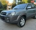 Серый Хендай Туксон, объемом двигателя 2 л и пробегом 110 тыс. км за 10200 $, фото 4 на Automoto.ua