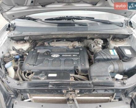 Серый Хендай Туксон, объемом двигателя 2 л и пробегом 168 тыс. км за 7000 $, фото 26 на Automoto.ua