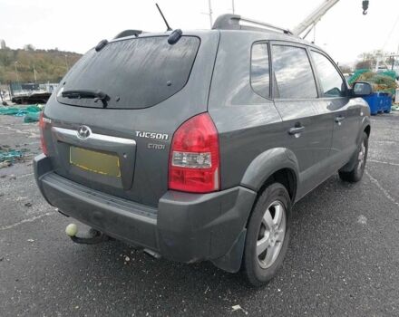 Серый Хендай Туксон, объемом двигателя 2 л и пробегом 245 тыс. км за 4112 $, фото 2 на Automoto.ua