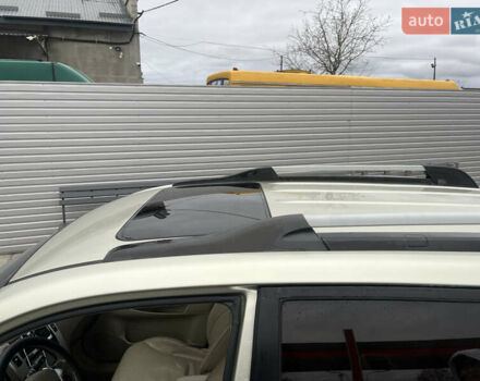 Серый Хендай Туксон, объемом двигателя 1.98 л и пробегом 194 тыс. км за 5500 $, фото 8 на Automoto.ua