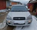 Серый Хендай Туксон, объемом двигателя 2 л и пробегом 250 тыс. км за 8600 $, фото 1 на Automoto.ua