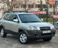 Серый Хендай Туксон, объемом двигателя 1.98 л и пробегом 167 тыс. км за 7300 $, фото 1 на Automoto.ua