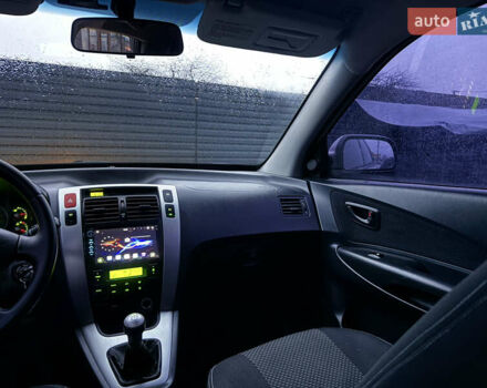 Сірий Хендай Туксон, об'ємом двигуна 2 л та пробігом 305 тис. км за 7350 $, фото 13 на Automoto.ua