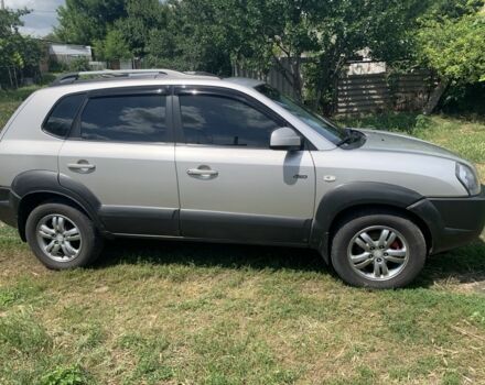 Серый Хендай Туксон, объемом двигателя 2 л и пробегом 228 тыс. км за 7400 $, фото 4 на Automoto.ua