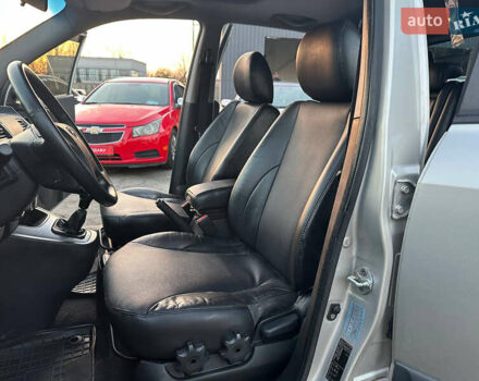 Серый Хендай Туксон, объемом двигателя 1.98 л и пробегом 167 тыс. км за 7300 $, фото 14 на Automoto.ua