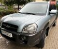Серый Хендай Туксон, объемом двигателя 1.98 л и пробегом 218 тыс. км за 7900 $, фото 1 на Automoto.ua