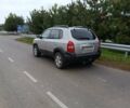 Сірий Хендай Туксон, об'ємом двигуна 2 л та пробігом 335 тис. км за 7200 $, фото 3 на Automoto.ua