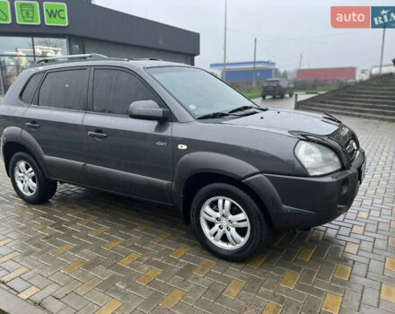 Серый Хендай Туксон, объемом двигателя 1.98 л и пробегом 242 тыс. км за 7499 $, фото 10 на Automoto.ua